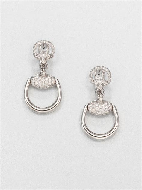 gucci diamond stud earrings.